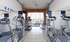 Modern fitness center with state-of-the-art cardio machines, sleek treadmills, and an inspiring ambiance for an energizing workout.