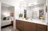2-Bedroom Apartments in Queen Creek, AZ - Acero Harvest Station - Bathroom with Built-In Shelves, a Double Sink Vanity, and a Large Mirror