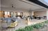 Dog-Friendly Apartments in Queen Creek, AZ - Acero Harvest Station - Outdoor Lounge with Seating Area, Table Tennis, and Large Jenga Blocks