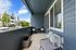 Charming outdoor patio with modern seating, featuring scenic views and inviting atmosphere perfect for relaxation.