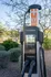 Modern ChargePoint EV charging station set against a lush green landscape, offering convenient electric vehicle charging solutions.