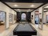 Modern recreation room featuring a sleek billiards table and stylish seating, perfect for entertaining and relaxation.