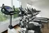 Modern apartment gym with state-of-the-art exercise equipment and scenic outdoor views.