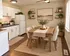 Elegant kitchen and dining area with modern white cabinet