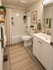 Inviting bathroom with elegant bathtub/shower, modern fixtures