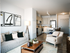 The pleasant living room creates a warm and comfortable atmosphere perfect for daily relaxation. | The Chandler | Apartment in,Bedford NH