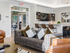 Brand new community room with comfortable seating  at Princeton Westford apartments in Westford, MA.