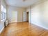 The well-proportioned living room offers versatile space for relaxation, entertainment, and personal expression. | Princeton on Beacon Street | Apartment in Brookline, MA