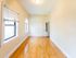 living room creates a warm and comfortable atmosphere perfect for daily relaxation.  | Princeton on Beacon Street | Apartment in Brookline, MA