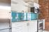 This inviting kitchen creates a warm gathering space where cooking and conversation flow naturally together.  | 381 Congress Lofts |