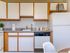 Kitchen including all white appliances | at Princeton Reserve | Apartments Dracut MA