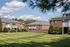 The overlooking grounds provide peaceful property views with mature landscaping and open space. | Princeton Green Apartments | Marlborough, MA Apartments