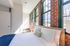 Your primary bedroom suite provides luxurious privacy with ensuite bathroom and walk-in closet convenience.  | Watch Factory Lofts | Waltham Apartments