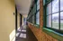 A bright and inviting hallway combines industrial architectural details with a bold, modern aesthetic throughout. | Watch Factory Lofts | Watch Factory Lofts Apartments