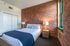Your roomy bedroom provides ample square footage with comfortable proportions for sleeping and storage. | Watch Factory Lofts | Apartment in,Waltham MA