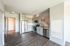 This renovated kitchen combines new finishes with improved layout for enhanced cooking and entertaining experience. | The Chandler |