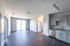 The pleasant living room creates a warm and comfortable atmosphere perfect for daily relaxation. | The Chandler | Apartment in,Bedford NH