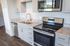 The gourmet-inspired kitchen features premium finishes and functional design elements for serious cooking enthusiasts. | The Chandler | Apartment in,Bedford NH