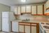 The modern kitchen offers streamlined design with efficient workflow and attractive finishes throughout.  | Princeton Place Apartments | Princeton Place Apartments