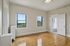 This elegant primary bedroom features sophisticated design elements and comfortable proportions for restful nights.  | Princeton on Beacon Street | Princeton on Beacon Street Apartments