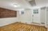 The pleasant living room creates a warm and comfortable atmosphere perfect for daily relaxation.  | Princeton on Beacon Street | Apartment in Brookline, MA