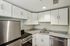 The gourmet-inspired kitchen features premium finishes and functional design elements for serious cooking enthusiasts.  | Princeton on Beacon Street |