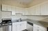 This inviting kitchen creates a warm gathering space where cooking and conversation flow naturally together.  | Princeton on Beacon Street |