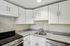 Your spacious kitchen offers generous square footage with room for multiple people and all your cooking essentials.  | Princeton on Beacon Street | Apartment in Brookline, MA