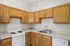 This prep-friendly kitchen maximizes workspace and storage with thoughtful layout designed for efficient cooking.  | Princeton on Beacon Street | Brookline Apartments