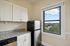 The modern kitchen offers streamlined design with efficient workflow and attractive finishes throughout.  | Princeton on Beacon Street | Princeton on Beacon Street Apartments