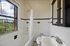 Your split-entry bathroom offers convenient access with functional design and comfortable proportions. | Princeton on Beacon Street |