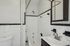 Your dual vanity in primary bathroom provides convenient space for two people with organized storage throughout.  | Princeton on Beacon Street | Brookline Apartments
