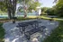 Dine alfresco in our designated picnic area featuring tables amid beautiful surroundings for outdoor meals. | Foreside Estates |