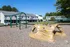 Delight children with our colorful playground featuring climbing structures, swings, and safe rubber surfacing.  | Foreside Estates | Foreside Estates Apartments