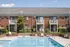 Your overlooking pool offers relaxing water views with recreational activities and community atmosphere. | Princeton Green Apartments | Marlborough, MA Apartments