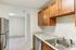 The gourmet-inspired kitchen features premium finishes and functional design elements for serious cooking enthusiasts.  | Princeton Place Apartments |