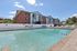 Our pool's water feature adds visual appeal and soothing sounds while enhancing your swimming and relaxation experience.  | Princeton Place Apartments | Princeton Place Apartments