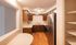 Charming kitchen with stainless steel appliances, wooden cabinets, and ample counter space, perfect for modern living.| The Royal Crest | Apartment in North Andover, MA