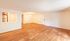 Spacious apartment with elegant hardwood flooring, an open-concept layout, and natural lighting from a large window.Your spacious kitchen offers generous square footage with room for multiple people and all your cooking essentials.  | The Royal Crest | Apartment in,North Andover MA