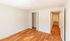 Bright and airy room with pristine wood flooring, ample closet space, and a contemporary hallway view, perfect for comfortable living.Your spacious kitchen offers generous square footage with room for multiple people and all your cooking essentials.  | The Royal Crest | Apartment in,North Andover MA