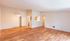 Inviting open-plan apartment showcasing elegant hardwood floors, a cozy kitchen nook, and abundant natural light.Your spacious kitchen offers generous square footage with room for multiple people and all your cooking essentials.  | The Royal Crest | Apartment in,North Andover MA