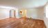 Inviting open-concept living area with elegant hardwood floors, ample natural light, and charming chandelier.Your spacious kitchen offers generous square footage with room for multiple people and all your cooking essentials.  | The Royal Crest | Apartment in,North Andover MA