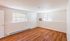 Bright, airy room with natural light, featuring elegant wooden flooring and large windows for a welcoming atmosphere.Your spacious kitchen offers generous square footage with room for multiple people and all your cooking essentials.  | The Royal Crest | Apartment in,North Andover MA