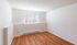 Bright, cozy room with sunlight streaming through a large window, highlighting elegant wood flooring and crisp white walls.Your spacious kitchen offers generous square footage with room for multiple people and all your cooking essentials.  | The Royal Crest | Apartment in,North Andover MA