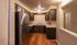 Charming kitchen with stainless steel appliances, rich wooden cabinets, and elegant lighting.Your spacious kitchen offers generous square footage with room for multiple people and all your cooking essentials.  | The Royal Crest | Apartment in,North Andover MA