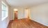 Bright and spacious room featuring elegant hardwood floors, large window with natural light, and an open closet for ample storage.Your spacious kitchen offers generous square footage with room for multiple people and all your cooking essentials.  | The Royal Crest | Apartment in,North Andover MA
