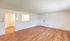 Bright and spacious room featuring elegant wood flooring, neutral walls, and an inviting entrance, perfect for creating a cozy home.Your spacious kitchen offers generous square footage with room for multiple people and all your cooking essentials.  | The Royal Crest | Apartment in,North Andover MA
