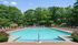 A crystal-clear swimming pool sits at the heart of the community, providing a vacation-like atmosphere just steps from home. | The Royal Crest | Apartment in North Andover, MA