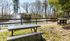 Serene park setting with a picturesque pond, elegant fountain, shaded gazebo, and inviting picnic area.| The Royal Crest | Apartment in North Andover, MA