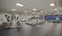 A bright and clean exercise room features contemporary equipment and mirrors, perfect for tracking your fitness progress. | The Royal Crest | Apartment in North Andover, MA